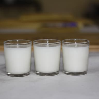 COLORED GLASS JAR SCENTED CANDLES BY CARO